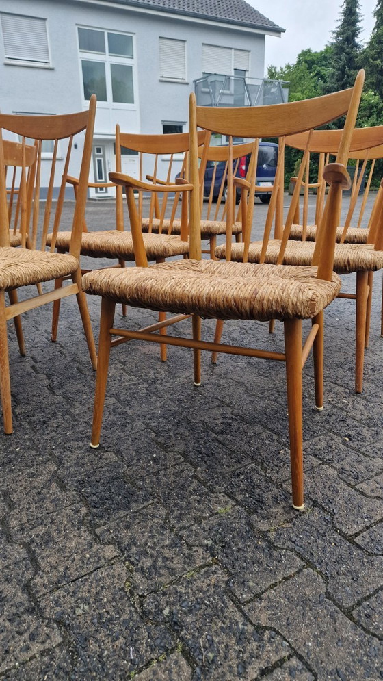 Image 1 of Juego de comedor de los años 50, madera de haya y caña – 6 sillas + banco, estilo Arno Lambrecht