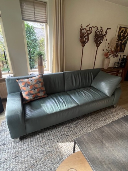 Leolux green leather sofa