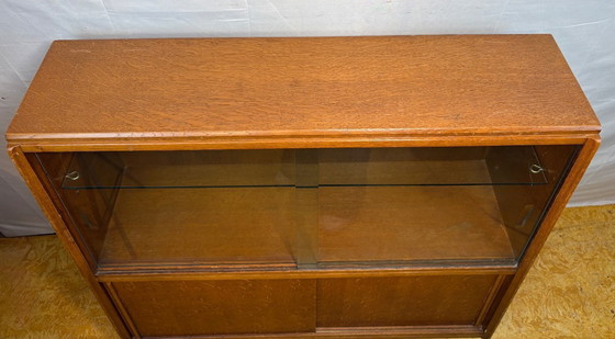 Image 1 of Mid-Century Retro Vintage Oak Display Cabinet by G Plan – Brandon Range   Compact Design • Sliding Doors • Iconic British Mid-Ce