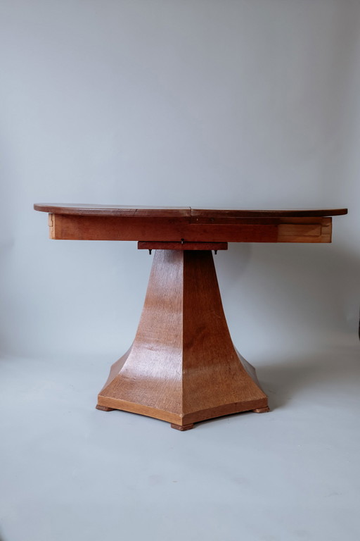Vintage round extendable dining table
