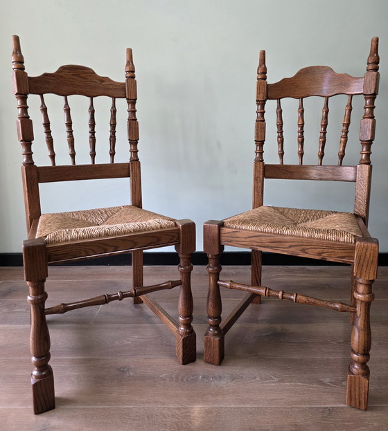 Image 1 of Set aus 4 Stühlen aus massiver Eiche mit Korbsitzen