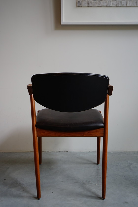 Image 1 of 6 Kai Kristiansen stoelen | Model 42 | Teak Leder patina
