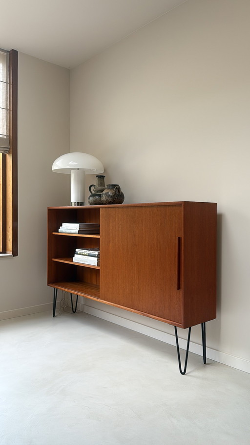 Vintage wooden sideboard with sliding door and shelves
