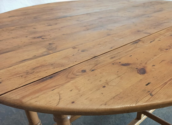 Image 1 of Vintage pine gateleg drop leaf dining table 