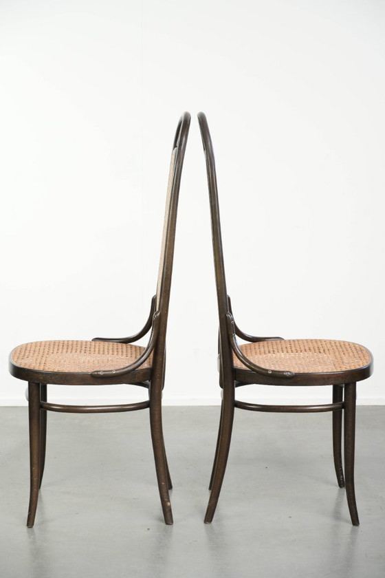 Image 1 of 6x Original vintage Thonet Long John chair with a high back, webbing seat and backrest, and gracefully curved wood