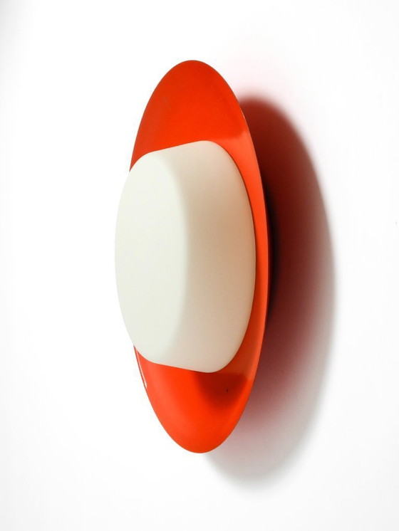 Image 1 of Grote Mid Century wand- of plafondlamp van glas met metalen reflector in rood van Kaiser Leuchten