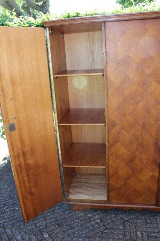 Image 1 of Vintage (50-60) 3-deurs houten kledingkast, 1/3 leg 2/3 hang