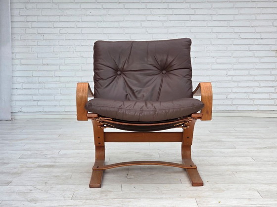 Image 1 of Fauteuil danois des années 1970 de la marque Komfort, cuir, toile et bois courbé.