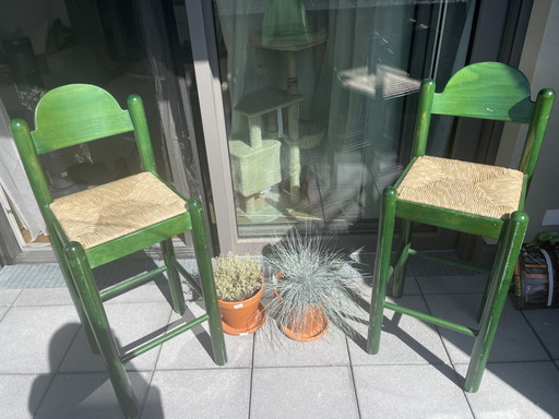 2x Vintage green lacquered rush-seat bar stools. Attributed to Hank Loewenstein Padova / Vico Magistretti Carimate style.