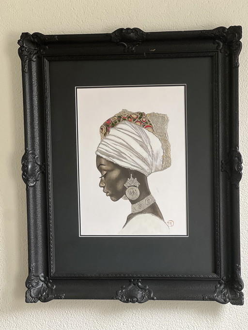 Portrait d'une femme noire dans un cadre à barrette