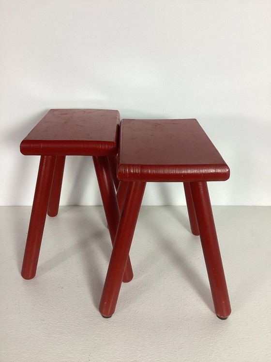 Image 1 of Two red vintage wooden stools side tables