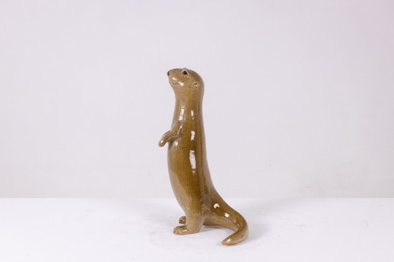 Image 1 of Valérie Courtet, Lontra in chamotte e gres smaltato. Opera contemporanea