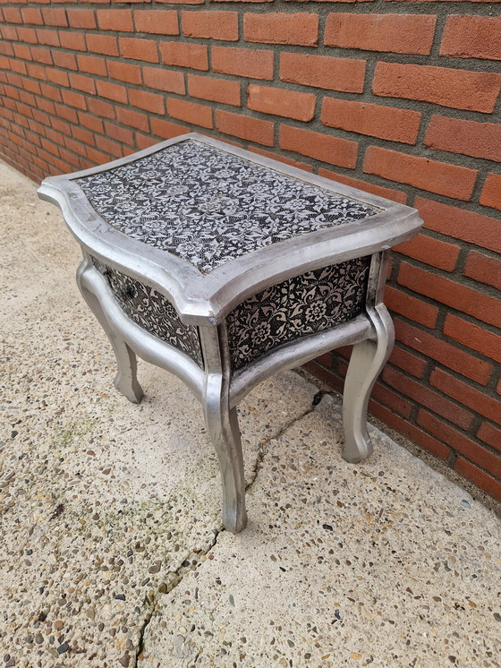 Image 1 of Silver-colored cabinet