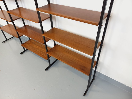 Image 1 of Vintage Italian triple modular bookcase in teak and metal from the 1960s