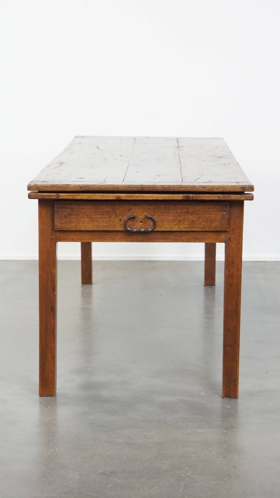 Image 1 of Antique French dining table from the early 19th century with two drawers and a breadboard / extendable top