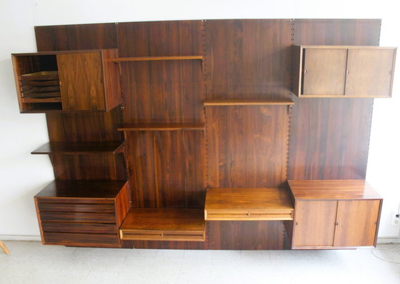 Mueble de pared en palisandro, de Poul Cadovius para Cado, Dinamarca. – Estanterías de pared, Wood (photo 5 of 17)