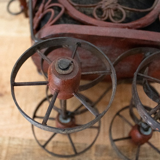 Image 1 of Antique Victorian-style doll pram