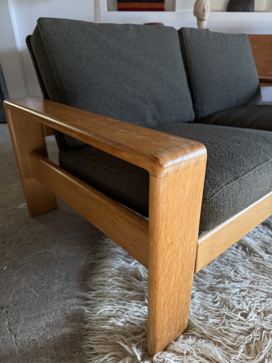 Image 1 of DIVANO 2 POSTI CARL STRAUB IN LEGNO DI FRASSINO E TESSUTO BOUCLÉ, ANNI '70