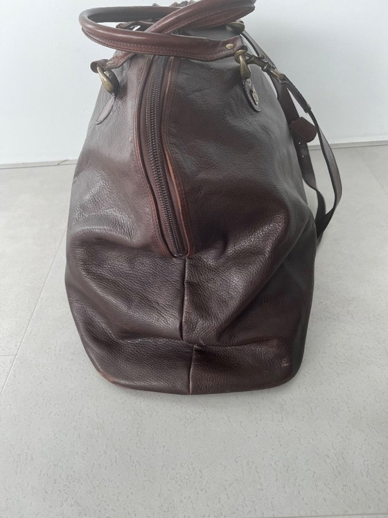 Image 1 of brown leather travel bag from Candy Corson leather atelier Amsterdam
