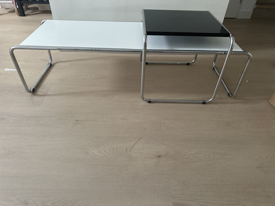 Image 1 of Mesa de centro y mesa auxiliar de diseño combinados.
