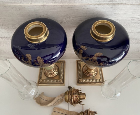 Image 1 of Duo di lampade a olio da salotto Inizio XX secolo Bronzo Terracotta Rame Giallo Cristallo