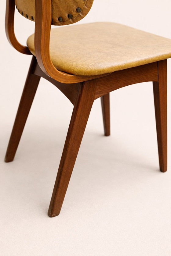 Image 1 of Chaises de salle à manger vintage en similicuir jaune/marron