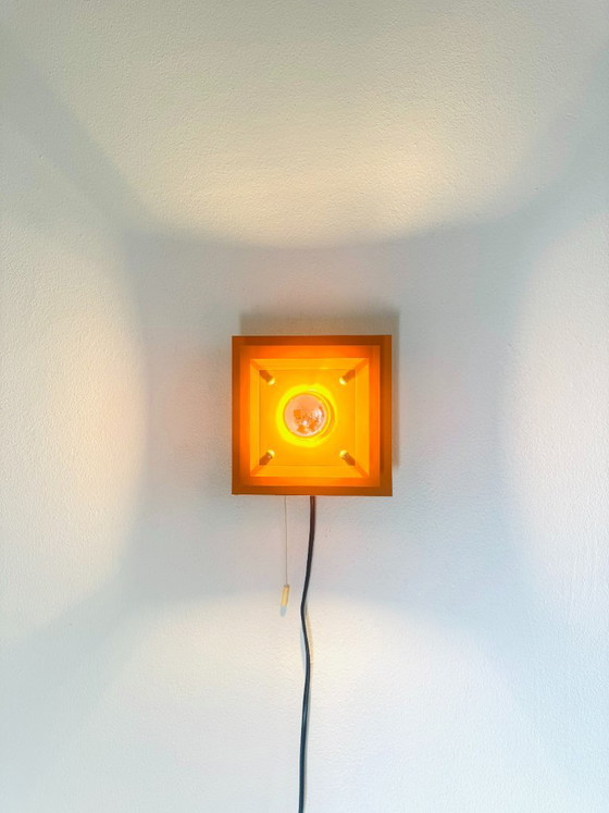 Pyramid layered wall lamp in orange by Hustadt Leuchten, Germany, 1960s – Wall lights, Metal (photo 4 of 6)
