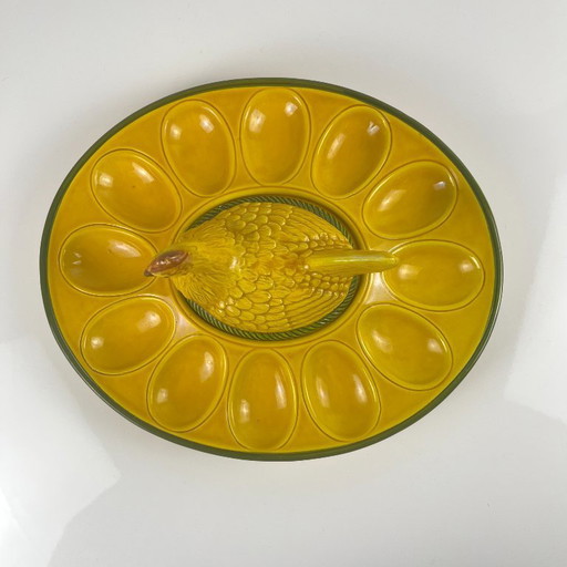 Yellow ceramic egg plate/display stand with hen, 20th century.