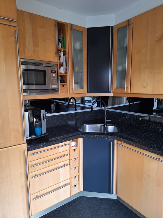 Image 1 of Eggersman corner kitchen with solid wood doors