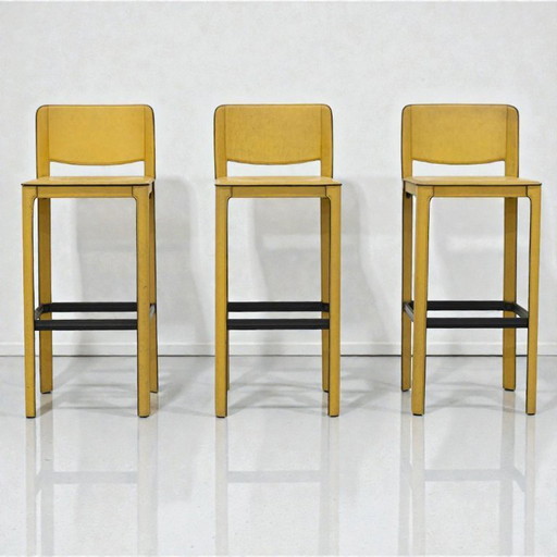 Sgabelli da bar in pelle di Tito Agnoli per Matteo Grassi