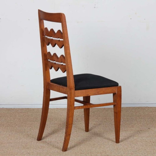 Solid oak chair, French work from the 1950s