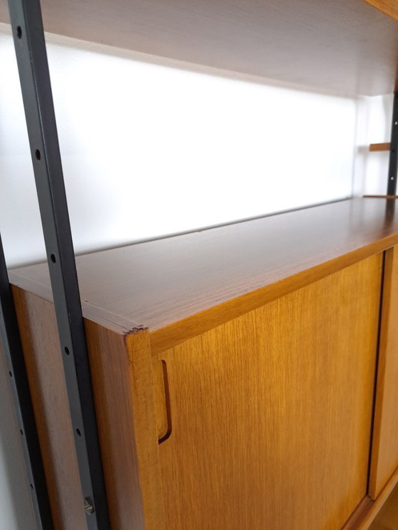 Image 1 of Parete componibile Omnia, Hilker, teak e acciaio nero con ripiani e mobiletto