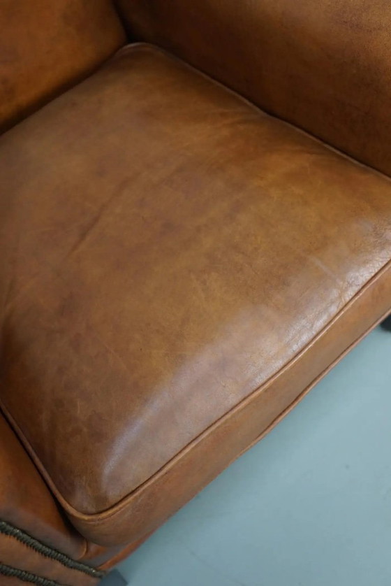 Image 1 of Vintage Nederlandse clubfauteuil van cognackleurig leer