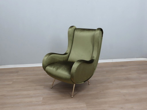 Sillón italiano de los años 50, estilo Senior Zanuso, de terciopelo verde.
