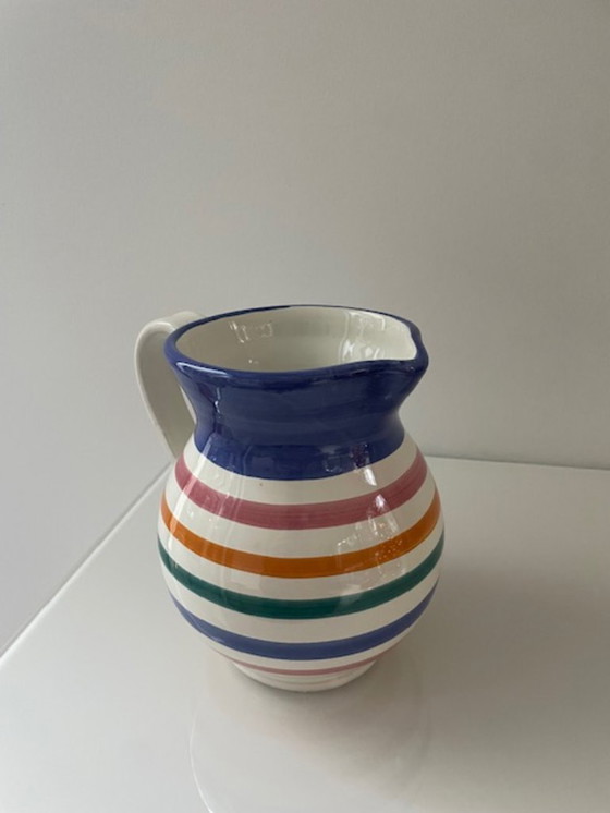 Image 1 of Handgemaakte vintage schenkkan met kleurrijke strepen