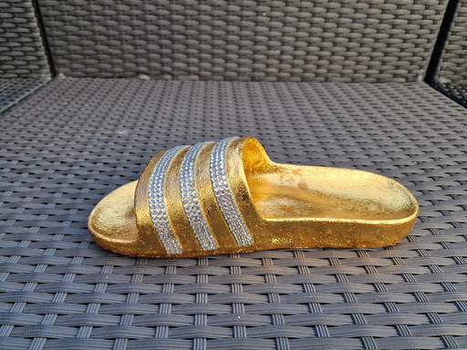 La pantoufle d'or / Bling