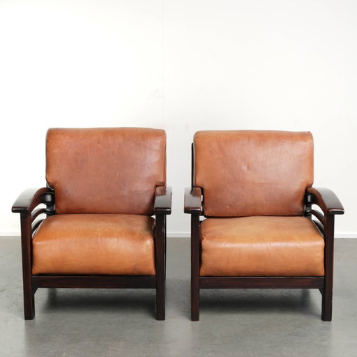 2 begehrenswerte cognacfarbene Rindsleder Art Deco Sessel aus dem 20. Jahrhundert