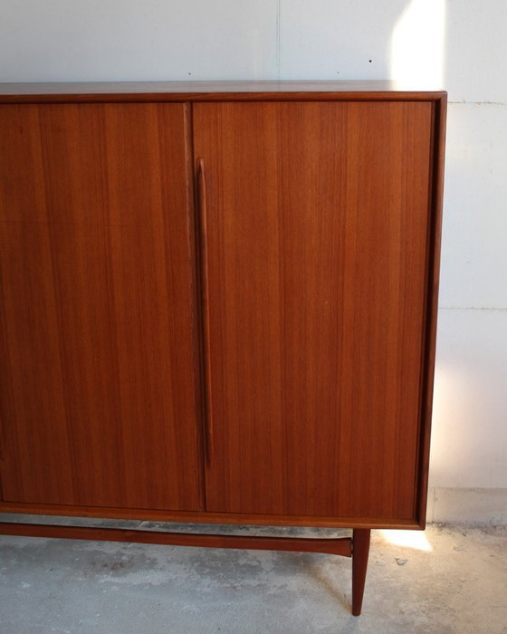 Image 1 of XXL teak highboard, German design classic by Heinrich Rietsenpatt