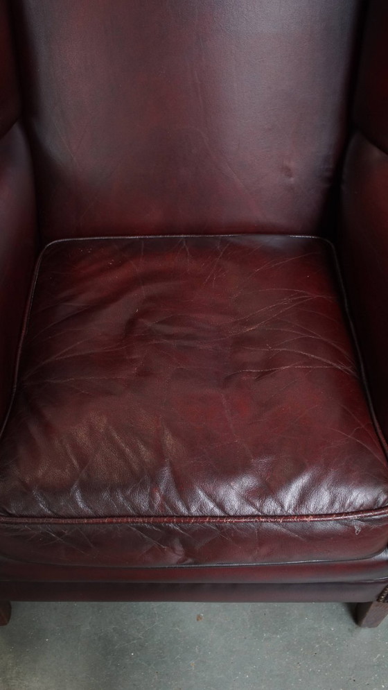 Image 1 of 2x Bordeauxrode rundleren oorfauteuils in Engelse stijl