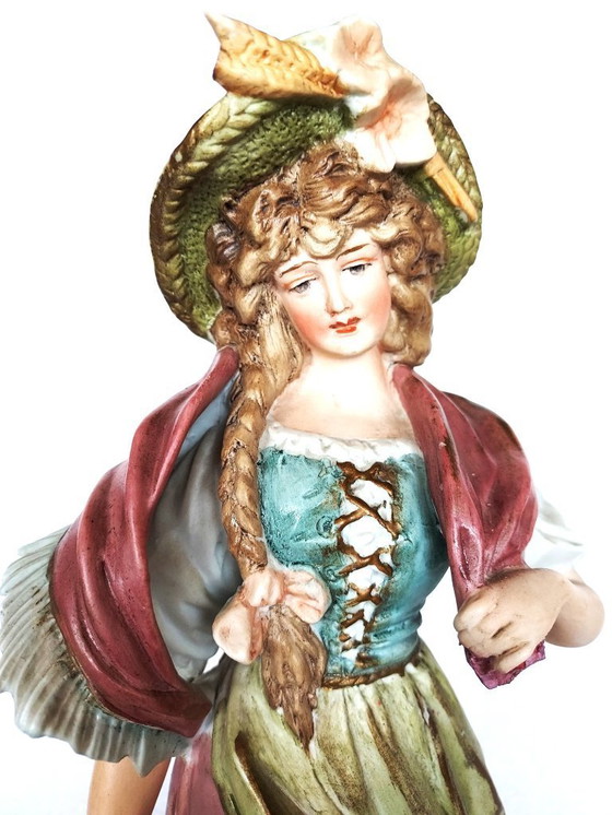 Image 1 of Porselein beeld