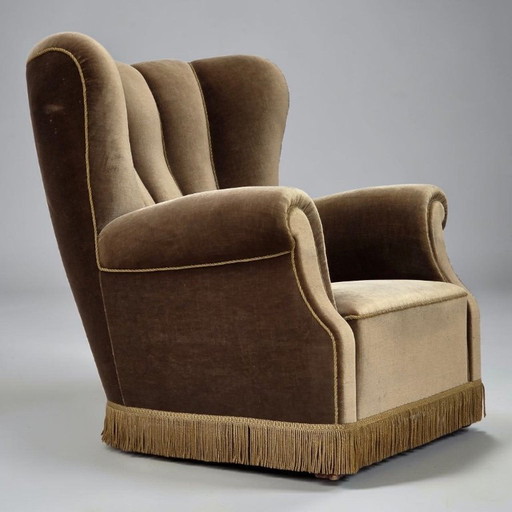 Sillón danés de los años 60, estilo relax, tapizado en terciopelo verde oscuro y madera de fresno.