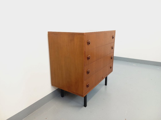 Image 1 of Vintage Scandinavische ladekast in teakhout en zwart metaal uit de jaren 60