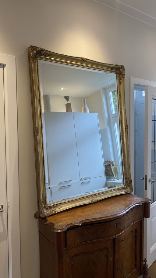 Antique mirror with solid wooden gold frame