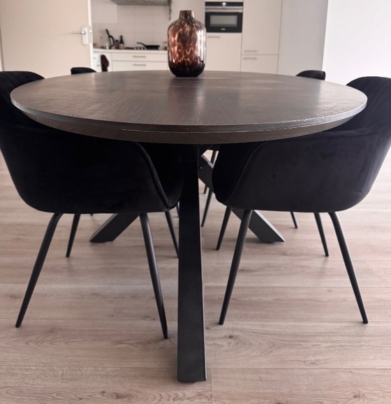 Oval dining table with dark brown top and black base, Haco, Wood, Metal, Modern (photo 4 of 7)