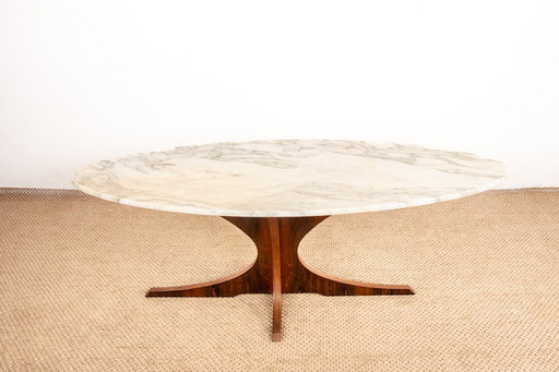 Oval coffee table in Carrara marble and rosewood by Hugues Poignant 1960.