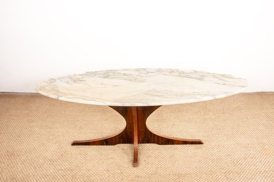 Image 1 of Oval coffee table in Carrara marble and rosewood by Hugues Poignant 1960.