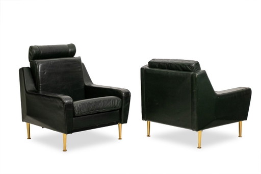 Airborne. Een paar groene leren fauteuils. Jaren 50.