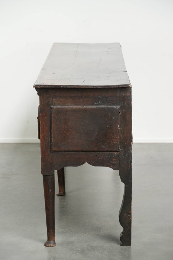 Image 1 of Large English antique oak sideboard/dresser with 3 working drawers from the early 18th century with a beautiful patina