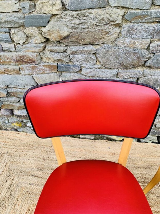 Image 1 of Ein Paar rote Stühle