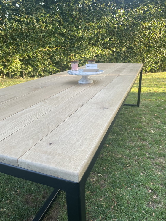 Image 1 of Oak dining table/garden table